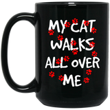 My Cat Walks All Over Me 11 and 15 oz Black Mugs
